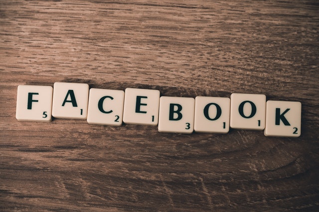 alphabet blocks that spell "Facebook" social media network