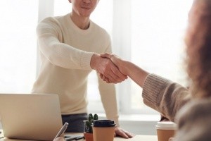 woman interviewing man