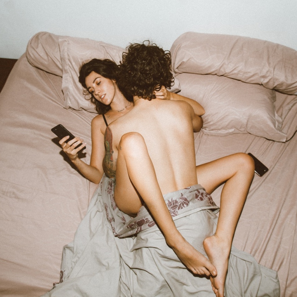lady texting during sex