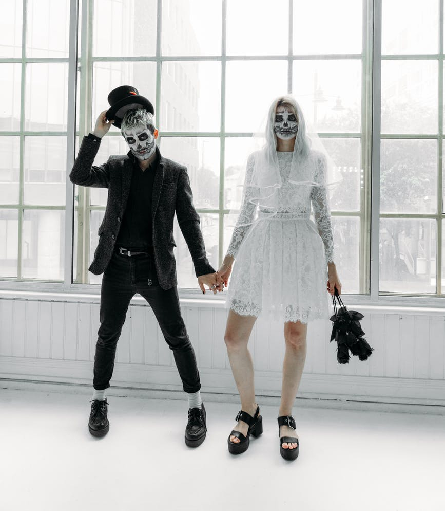 Man and lady dressed in scary Halloween costume