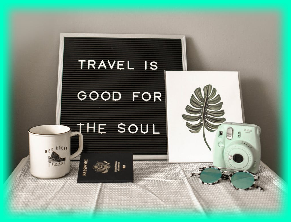 Sign that reads, "Travel is good for the soul"