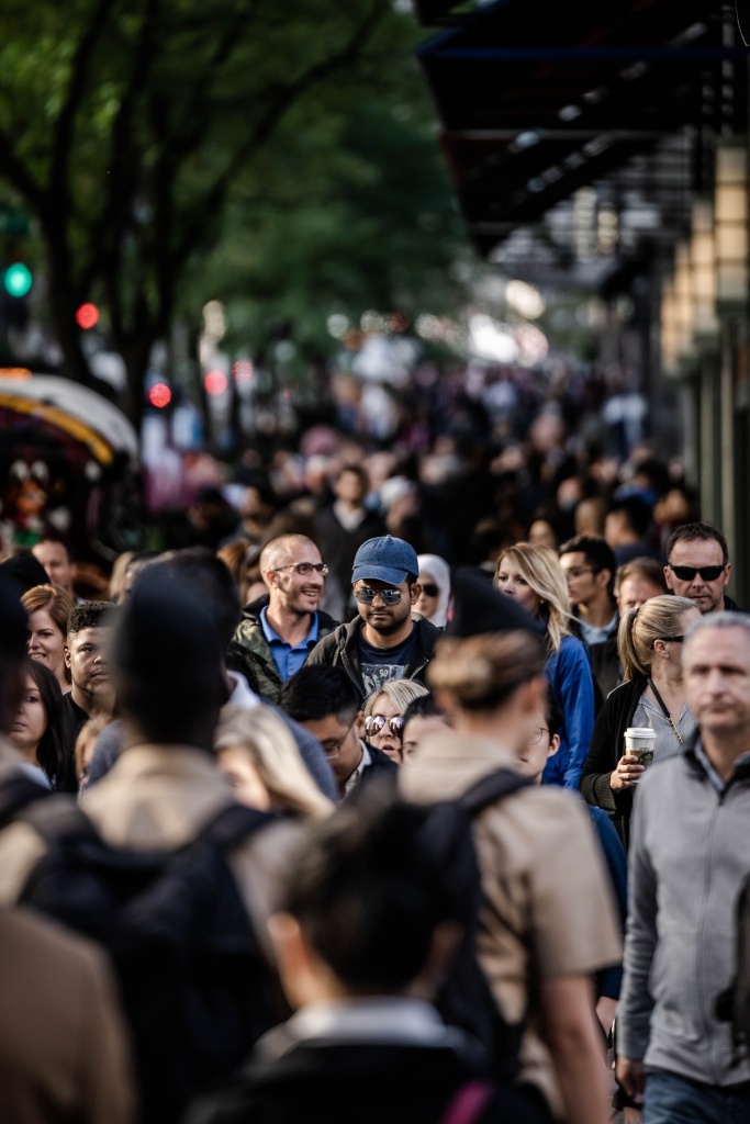 A large number of people walking