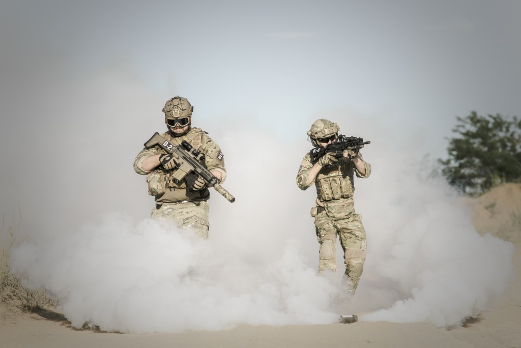 Two soldiers at a cross fire