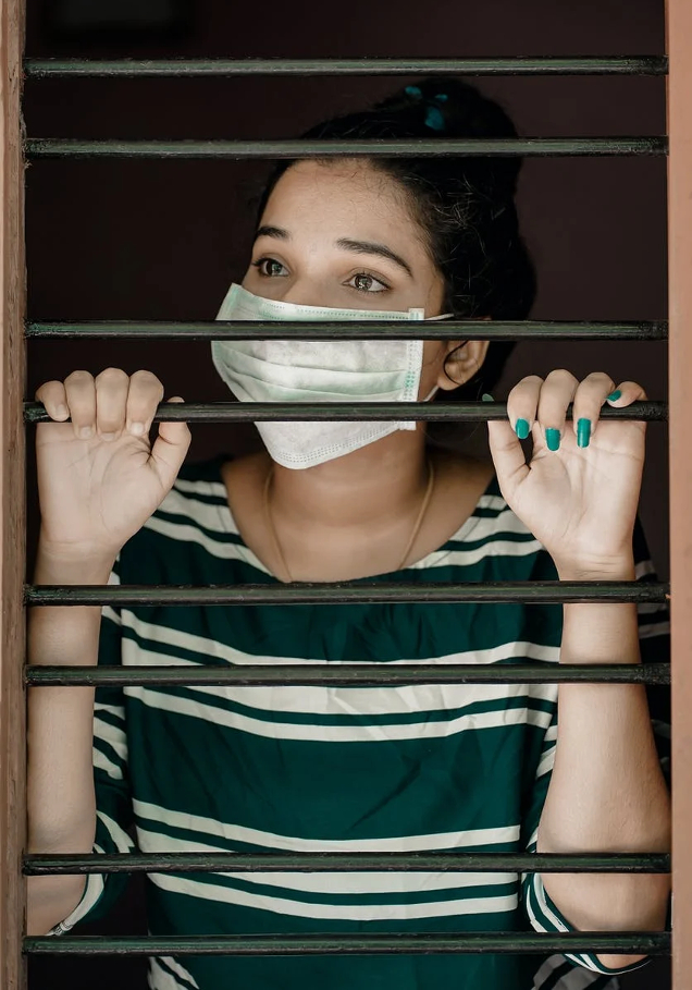Lady behind bars tired of COVID virus